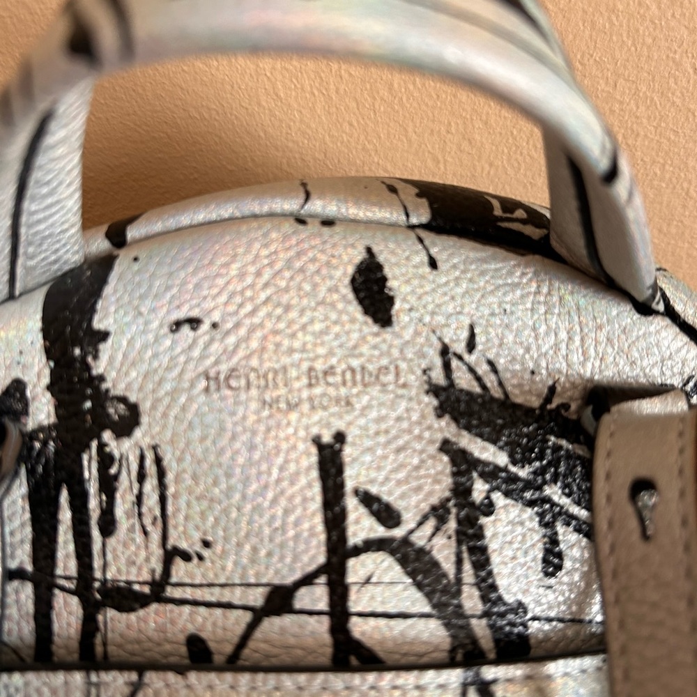 Henri Bendel iridescent paint splatter backpack